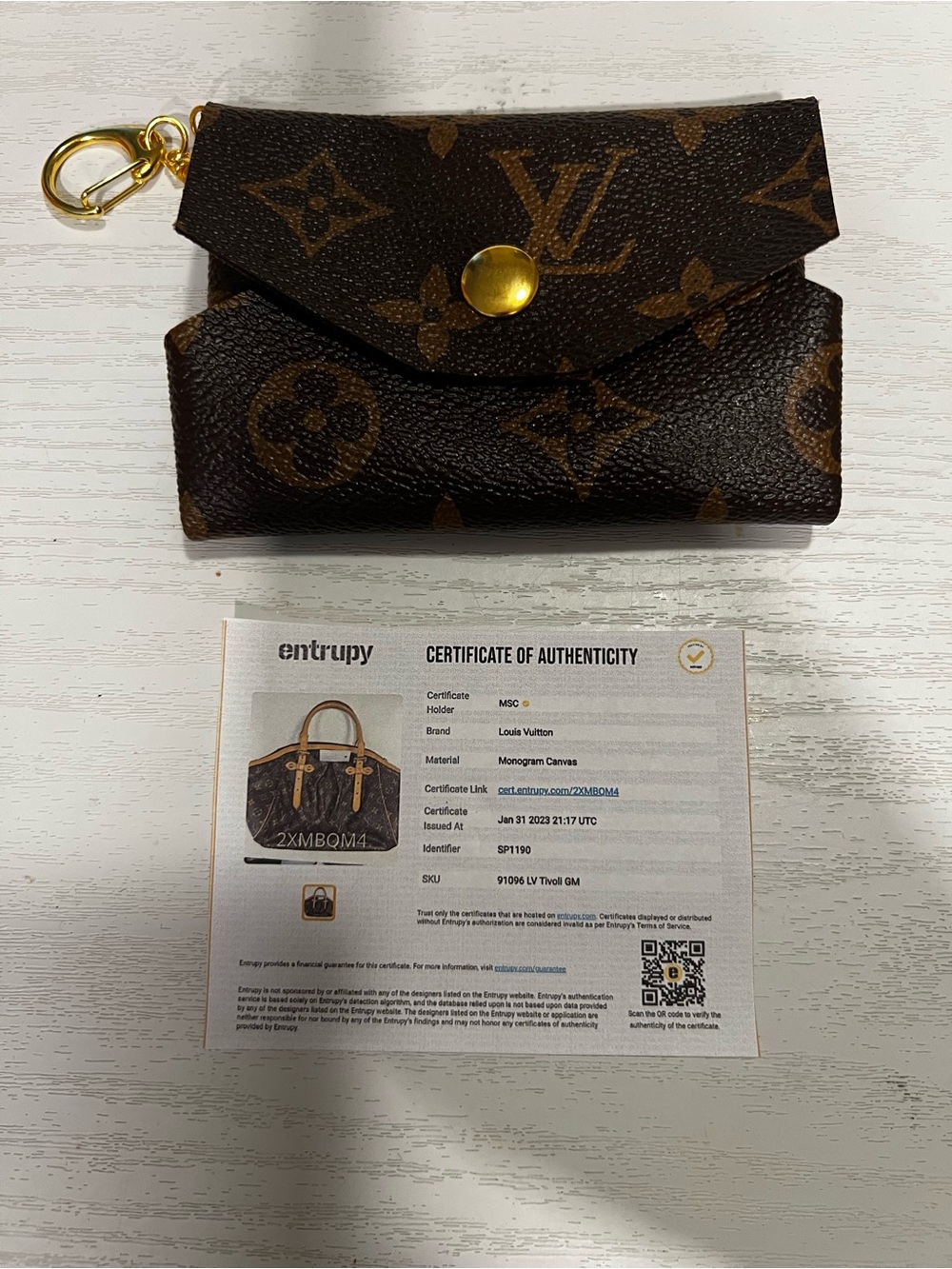 Coin purse made with Louis Vuitton material